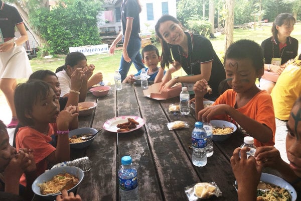 Eating lunch with kids at the orphanage